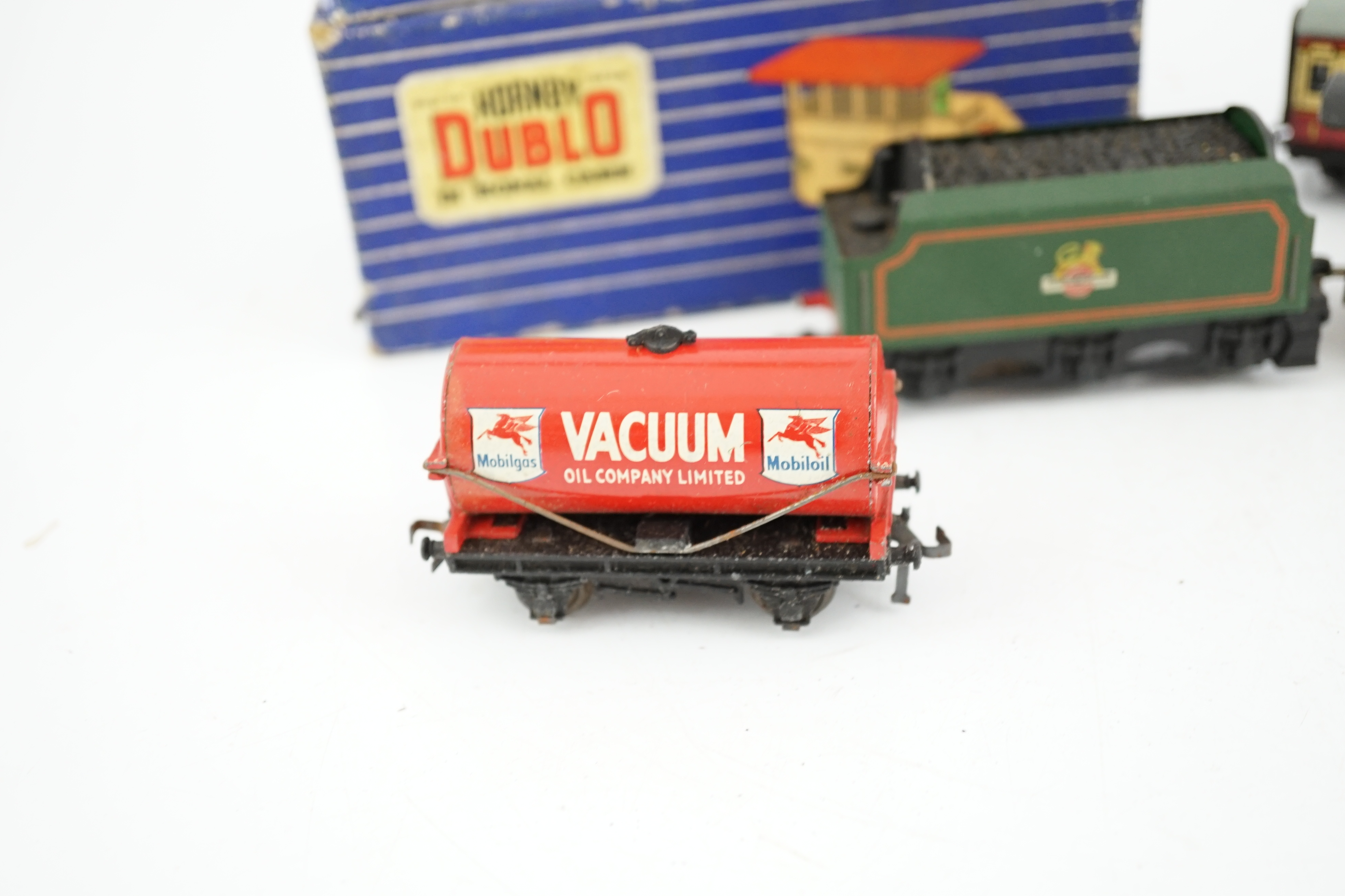A collection of Hornby Dublo for 3-rail running, including two BR locomotives; a Duchess of Montrose and a Class N2 0-6-2T, together with two tinplate bogie coaches, wagons, signal box, signals, and a small quantity of t